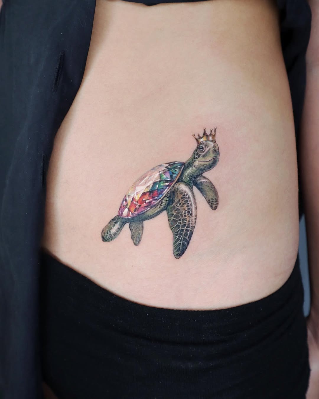 Regal turtle tattoo with gem for elegance Tattoo Design