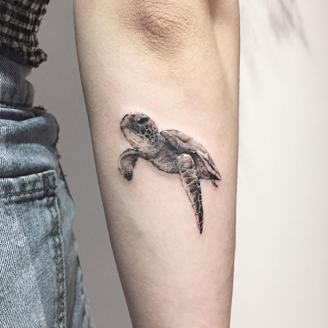 Stunning realistic turtle tattoo on forearm Tattoo Design