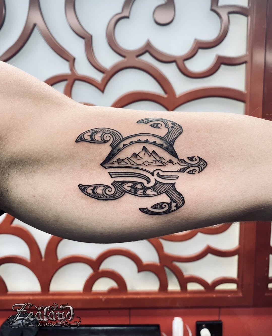 Tribal turtle tattoo with ocean wave elements Tattoo Design