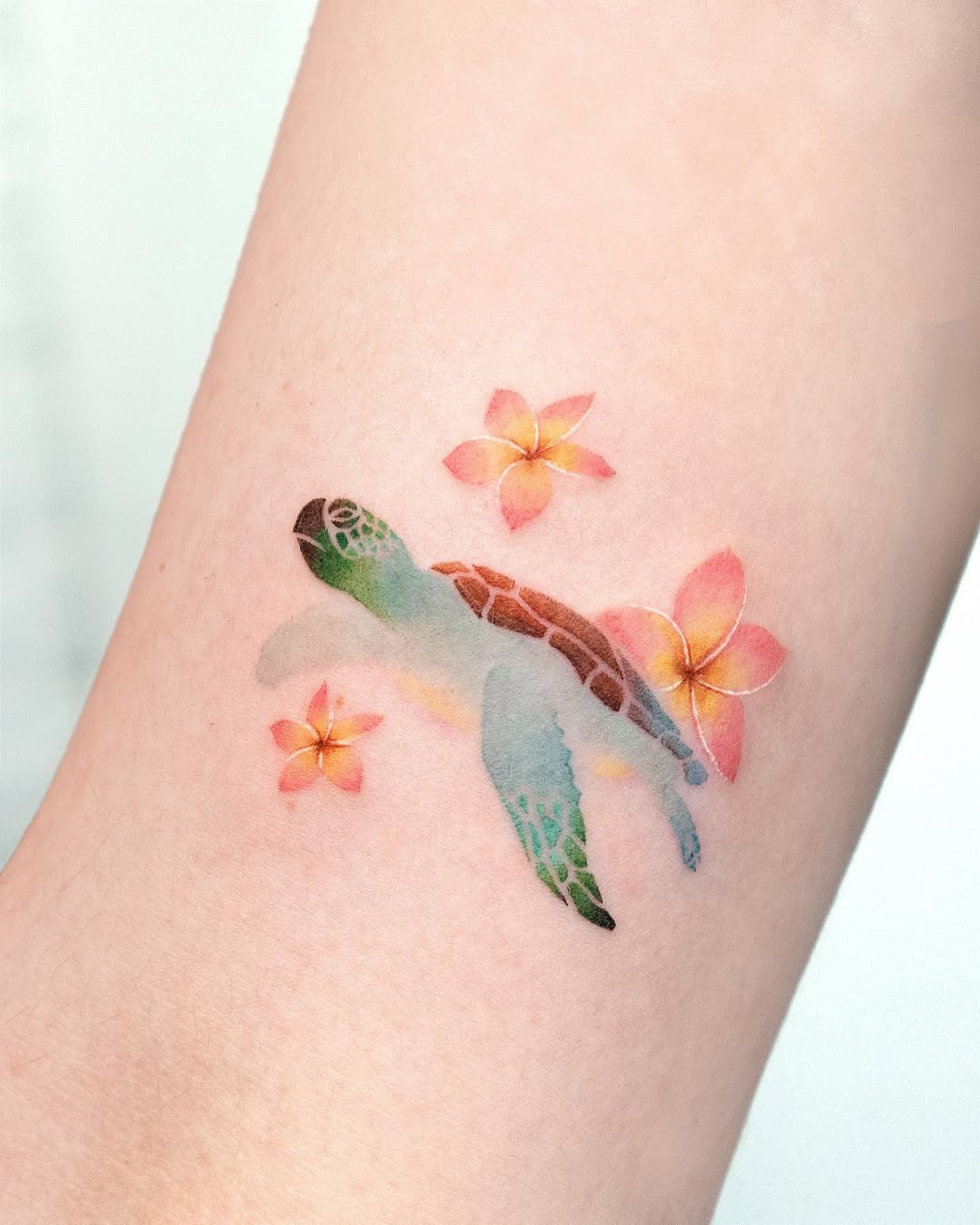 Vibrant watercolor turtle tattoo with flowers Tattoo Design