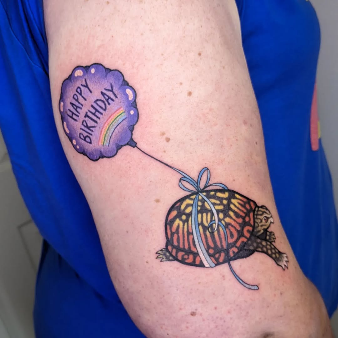Whimsical turtle tattoo celebrating a birthday Tattoo Design