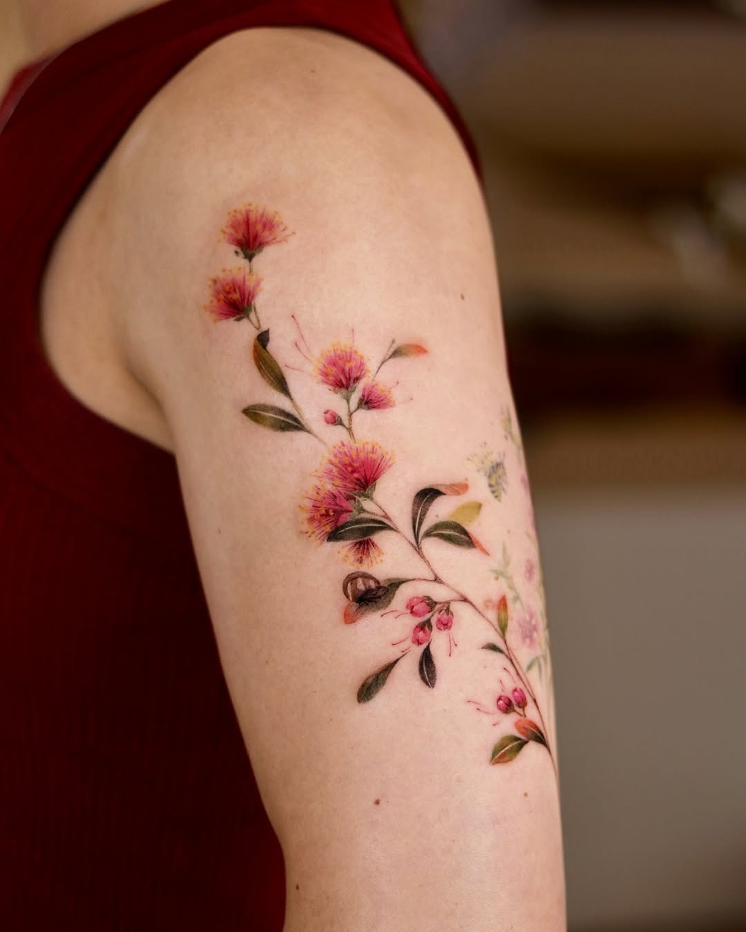 Delicate floral watercolor arm tattoo design Tattoo Design