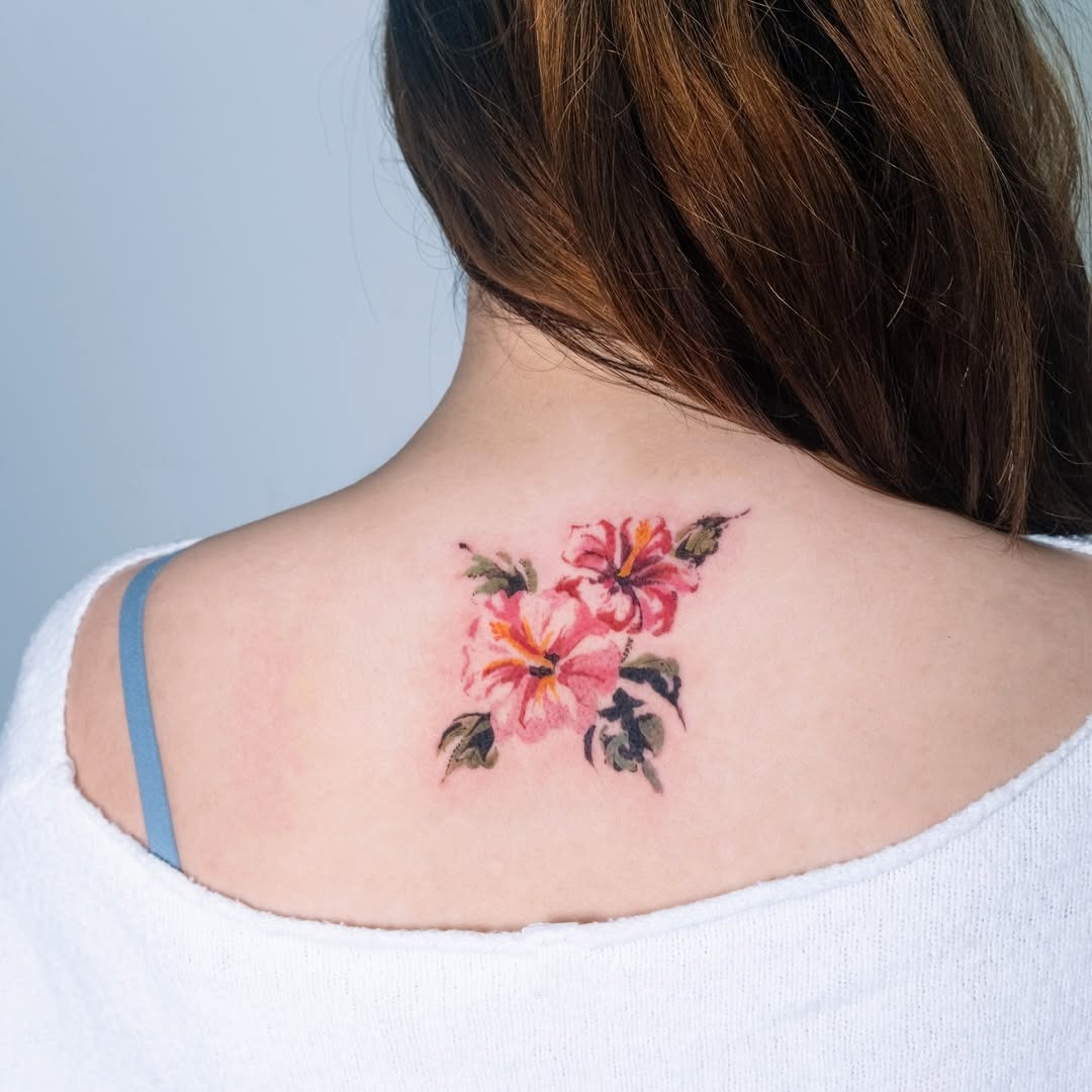 Delicate pink blooms in soft watercolor style Tattoo Design