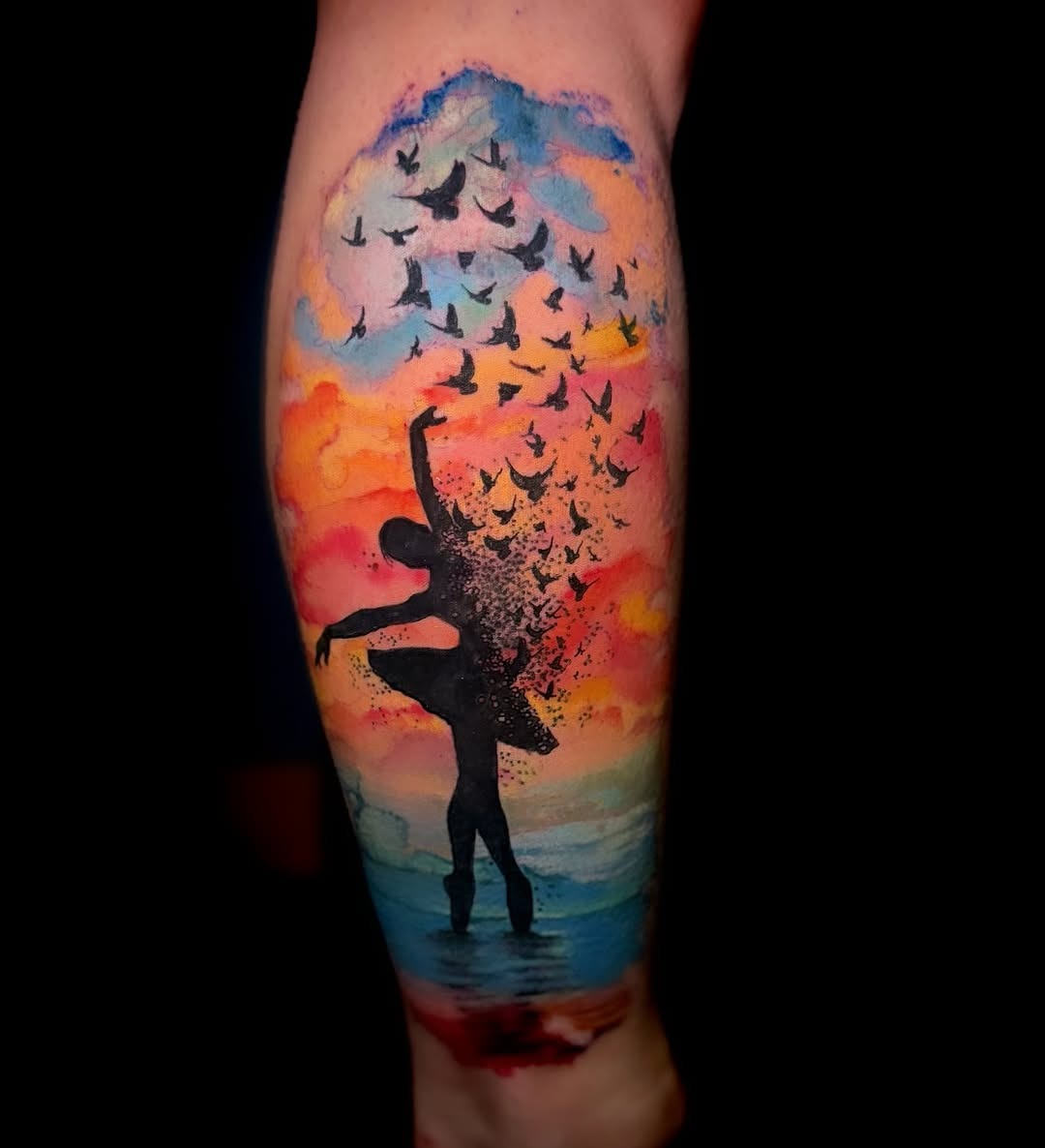 Elegant ballet dancer surrounded by vivid colors Tattoo Design