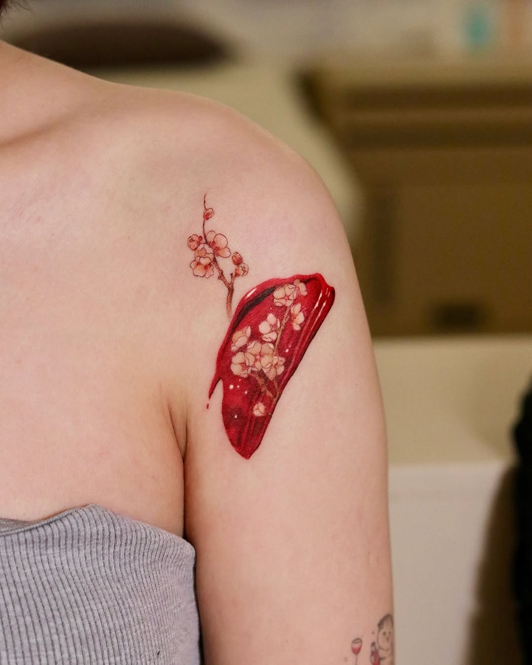 Elegant red floral watercolor tattoo design Tattoo Design