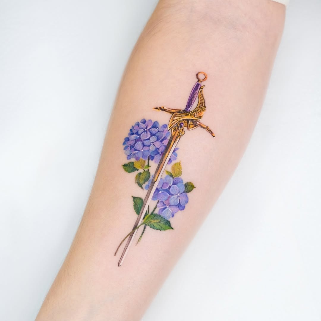 Elegant sword intertwined with vibrant hydrangea blooms Tattoo Design