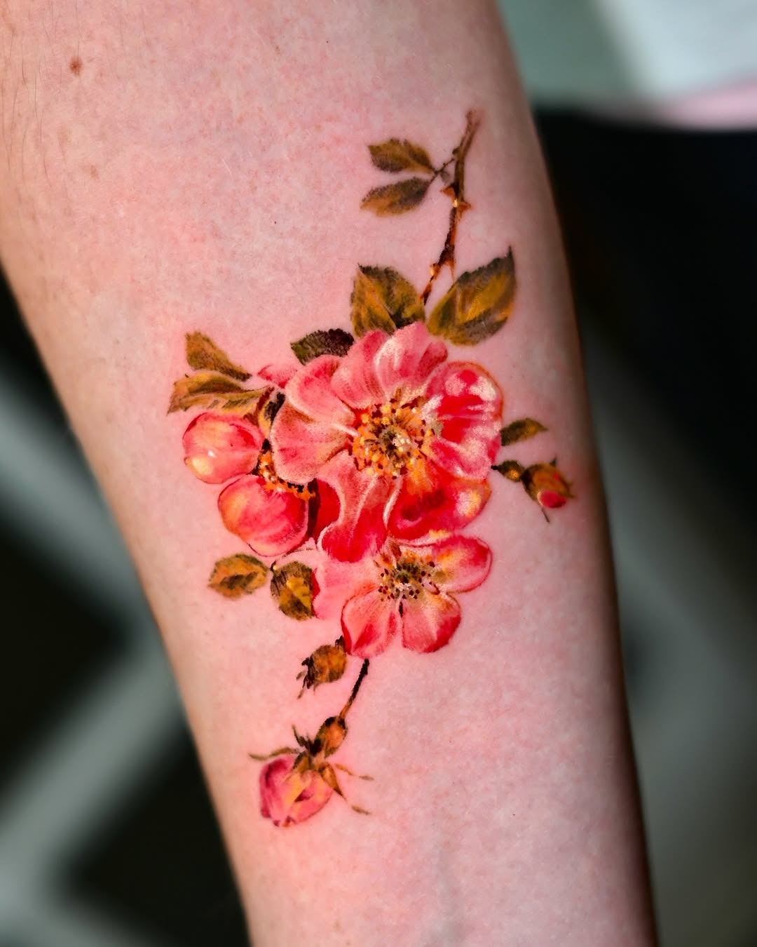 Elegant watercolor rose tattoo showcasing vibrant colors Tattoo Design
