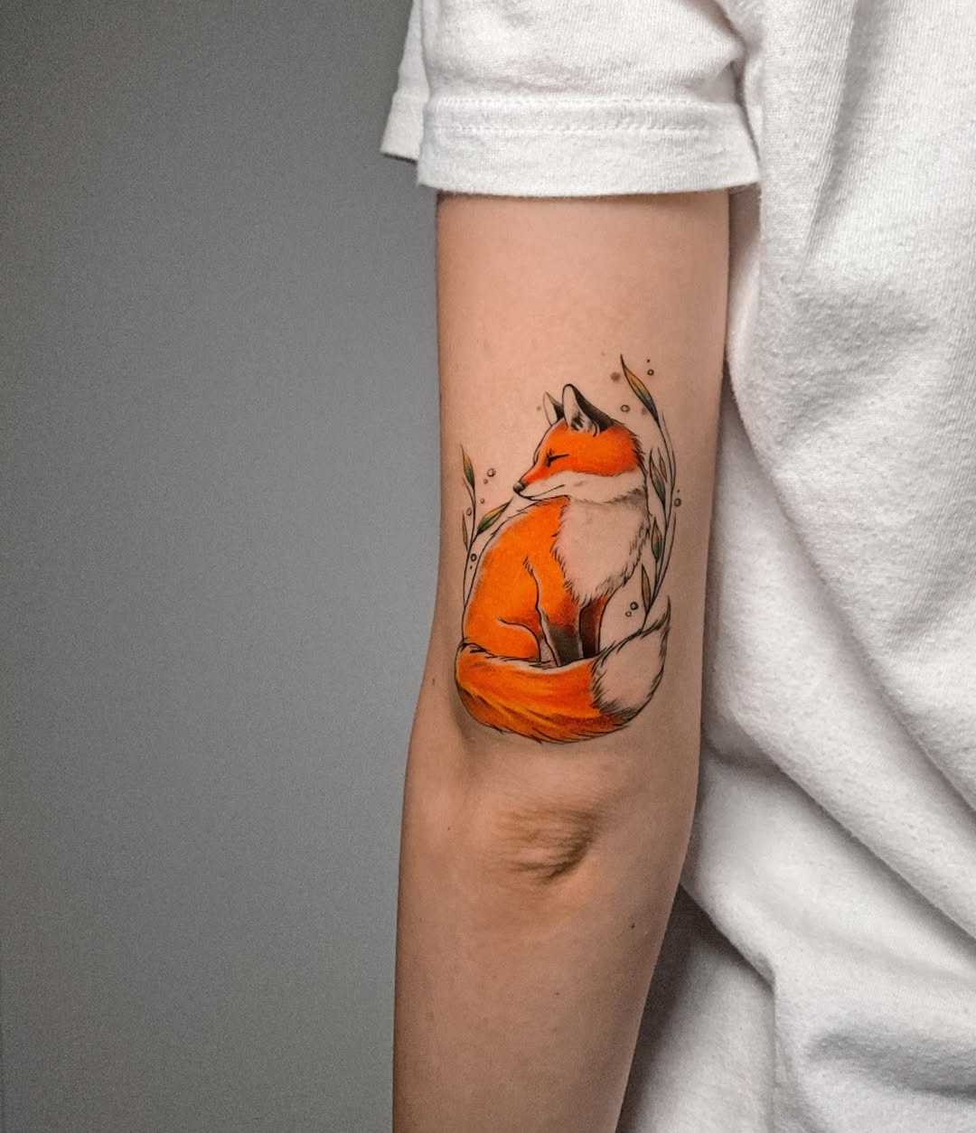 Enchanting watercolor fox tattoo on the arm Tattoo Design