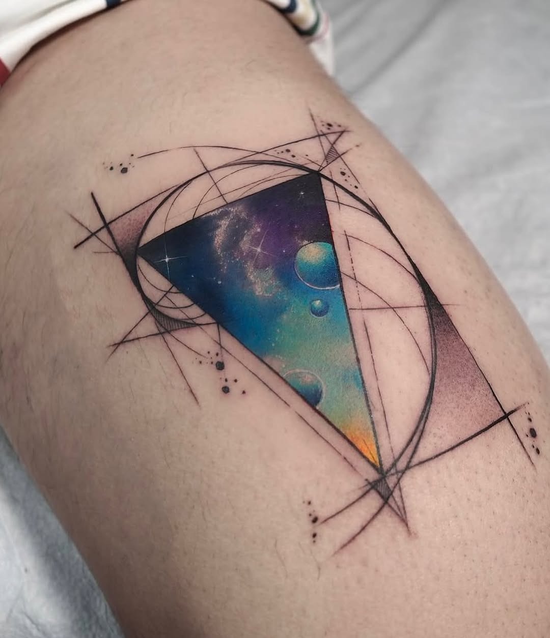 Stunning geometric watercolor tattoo with cosmic elements Tattoo Design