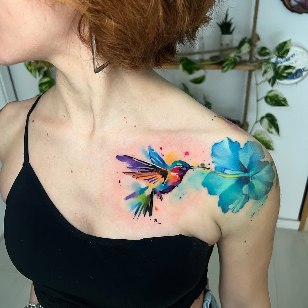 Stunning watercolor hummingbird and flower design Tattoo Design
