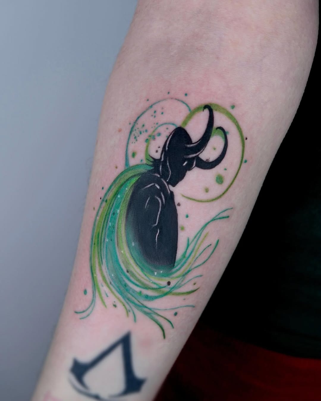 Vibrant octopus watercolor tattoo with flowing design Tattoo Design