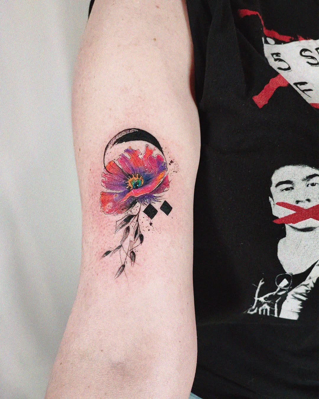 Vibrant watercolor flower with moon accents Tattoo Design