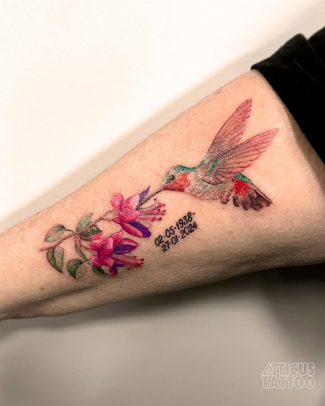 Vibrant watercolor hummingbird and floral tattoo Tattoo Design