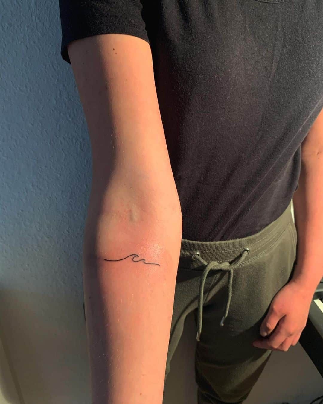 Tiny Minimal Arm Wave Tattoo Tattoo Design