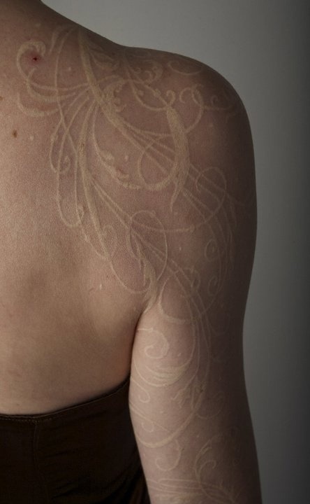 Ornamental White Shoulder Sleeve Tattoo Design