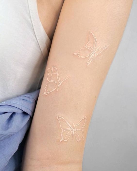 Trio of White Butterflies Tattoo Design