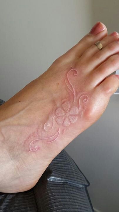 Whimsical Floral Foot Tattoo Tattoo Design