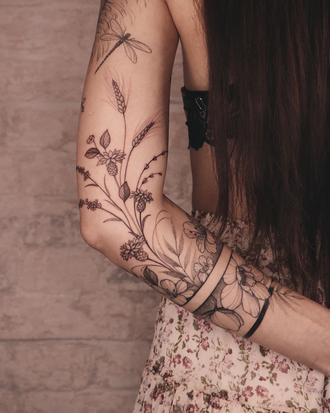 Rustic Meadow on the Arm, a tattoo design rendered in sketch-style.
