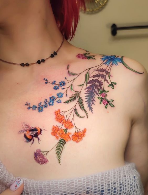 Shoulder Wildflower Garden with Bee, a tattoo design rendered in bold.