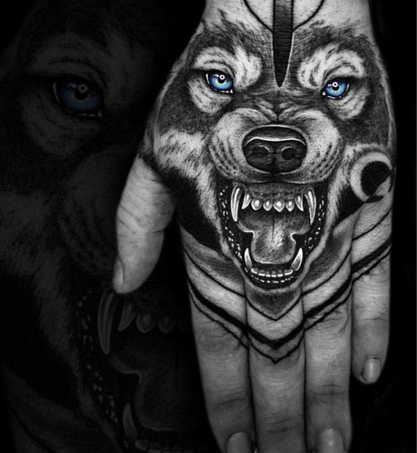 Blue-Eyed, Snarling Wolf Hand Tattoo Tattoo Design