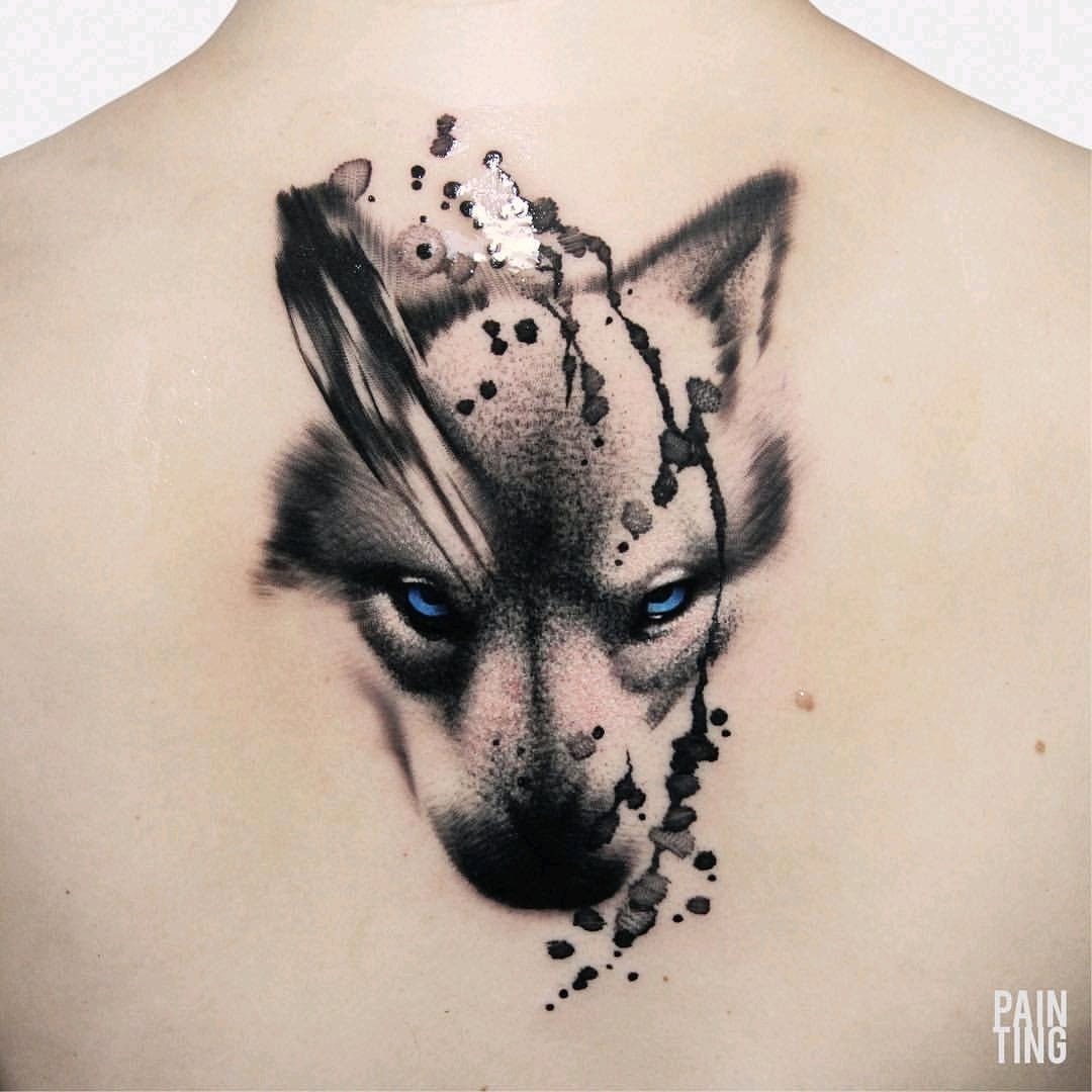 Blue-Eyed Wolf Face Tattoo Watercolor Style Tattoo Design