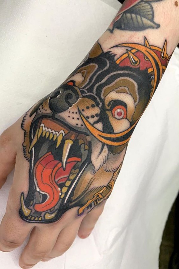 Colorful Snarling Wolf Hand Tattoo Tattoo Design