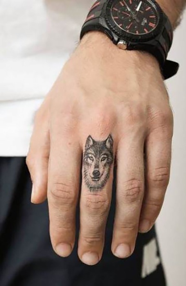 Realistic Black & White Wolf Finger Tattoo Tattoo Design