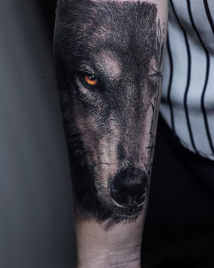 Realistic Wolf Face with Amber Eyes Tattoo Design