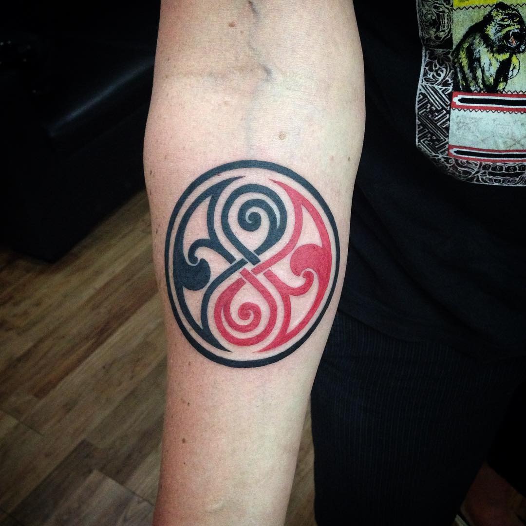 Colorful Yin Yang Tattoo with Intricate Swirls Tattoo Design