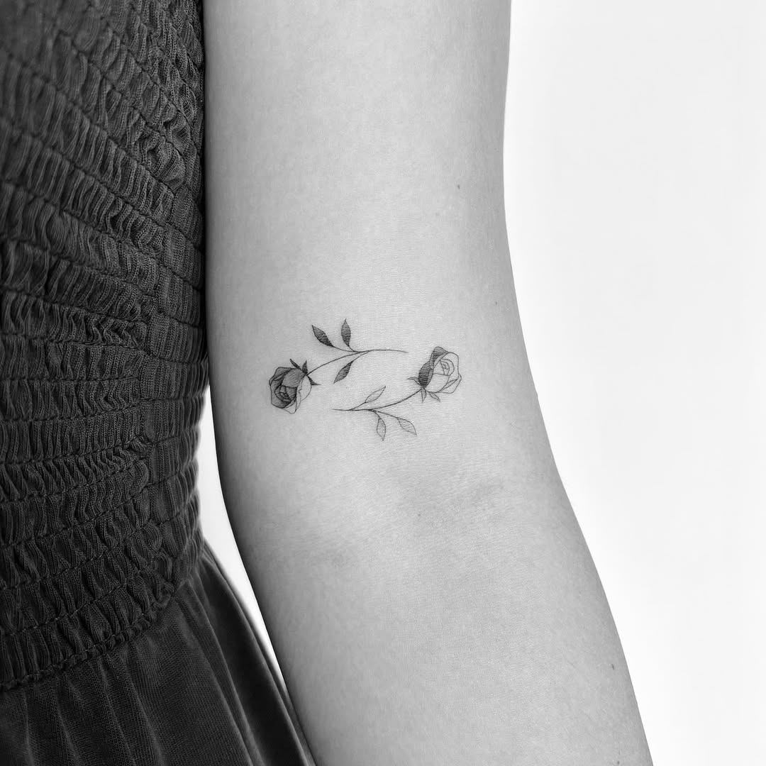 Delicate yin yang inspired rose tattoo design Tattoo Design