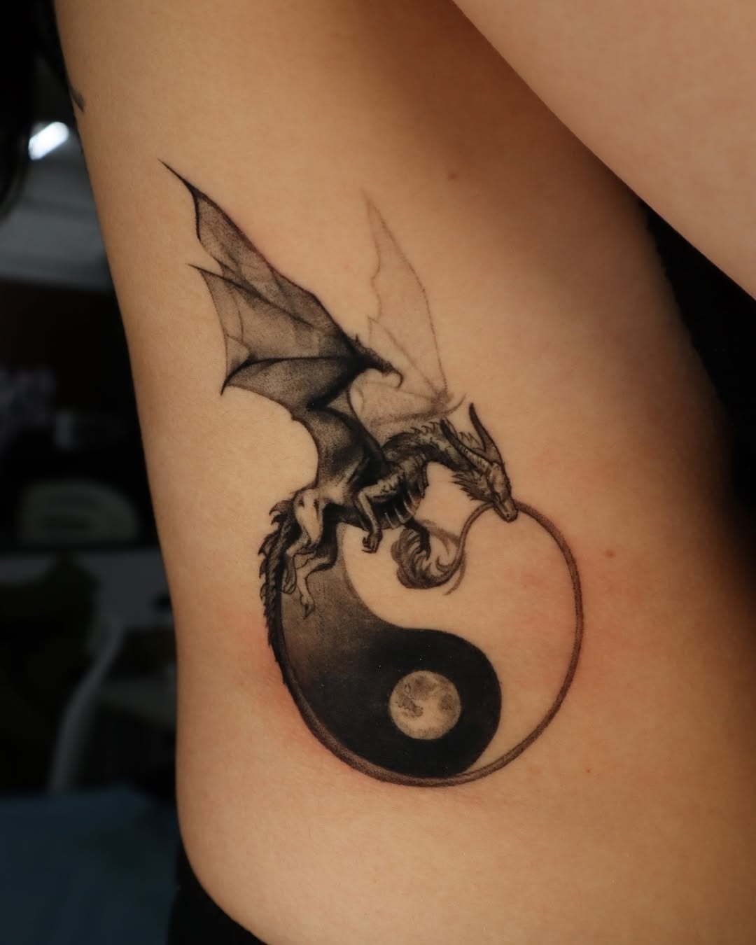 Dynamic dragon embodies harmony and balance Tattoo Design