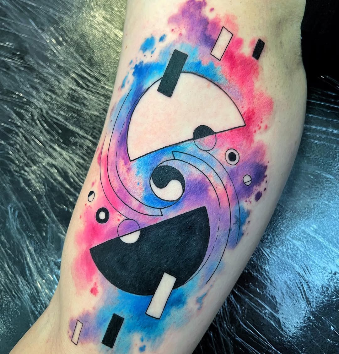 Dynamic yin yang tattoo with colorful splashes Tattoo Design