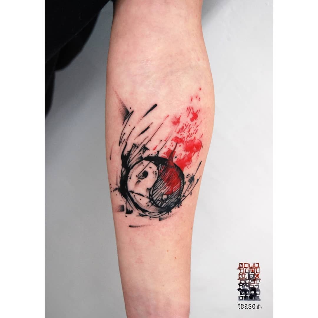 Dynamic yin yang tattoo with vibrant colors Tattoo Design