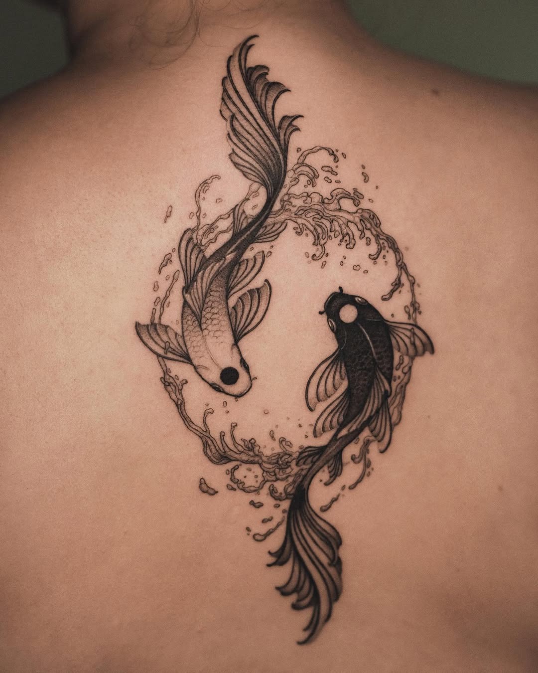 Elegant koi fish symbolizing balance and harmony. Tattoo Design