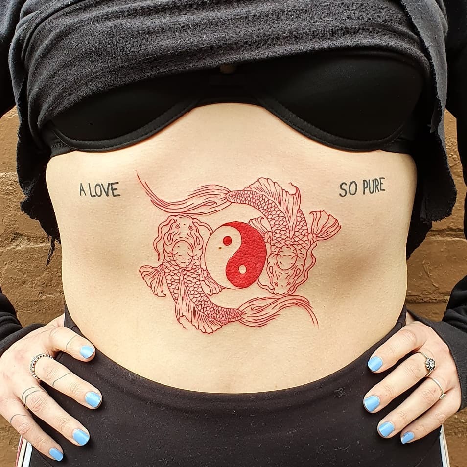 Intricate yin yang tattoo with koi fish design Tattoo Design