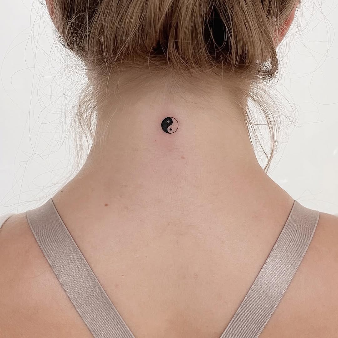 Minimalist Yin Yang Design on the Neck Tattoo Design