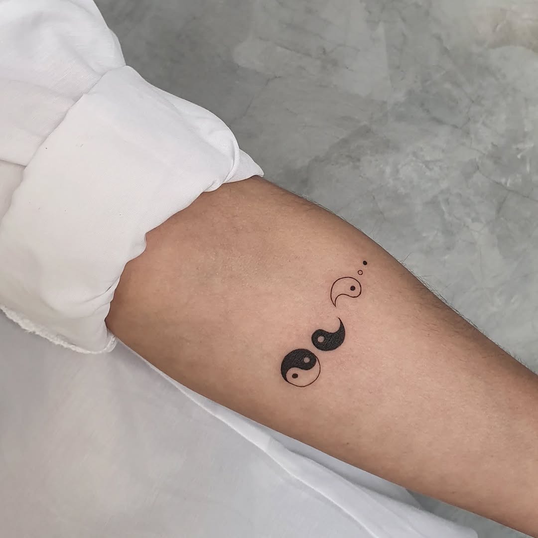 Minimalist Yin Yang Tattoo on Forearm Tattoo Design