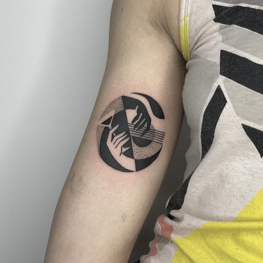 Unique yin yang tattoo featuring hands and music Tattoo Design