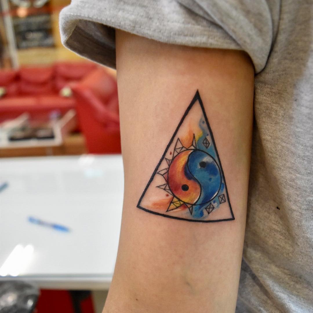 Vibrant Yin Yang Tattoo in Triangle Design Tattoo Design