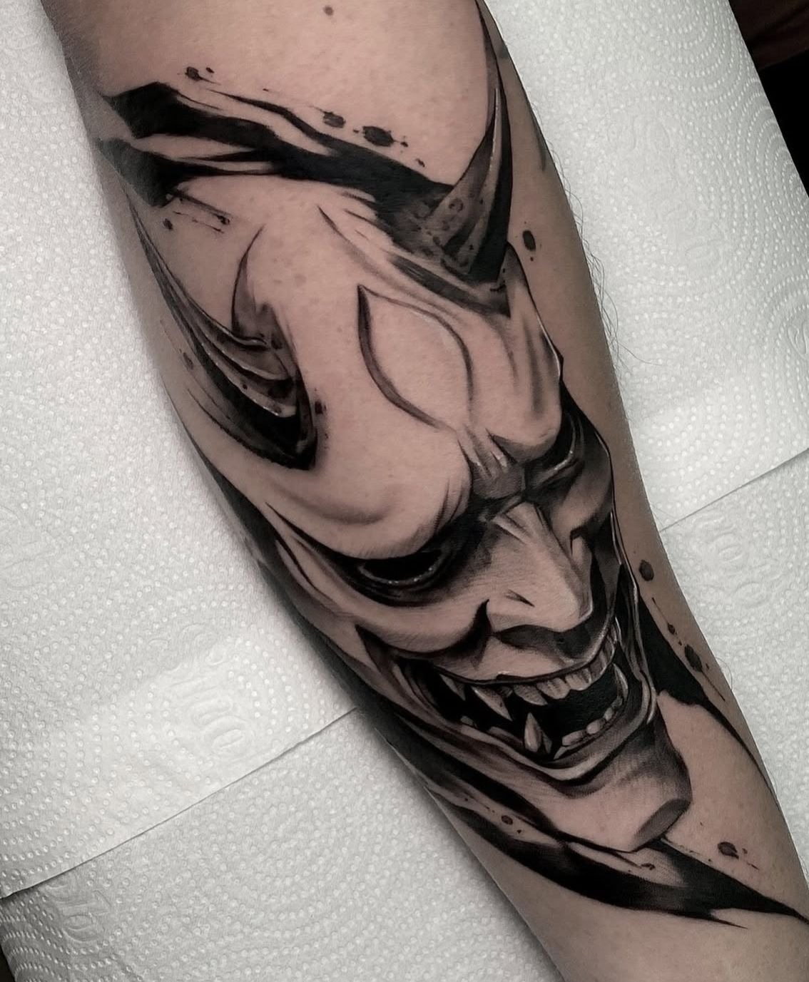 Japanese-Inspired Demon Mask Tattoo Design