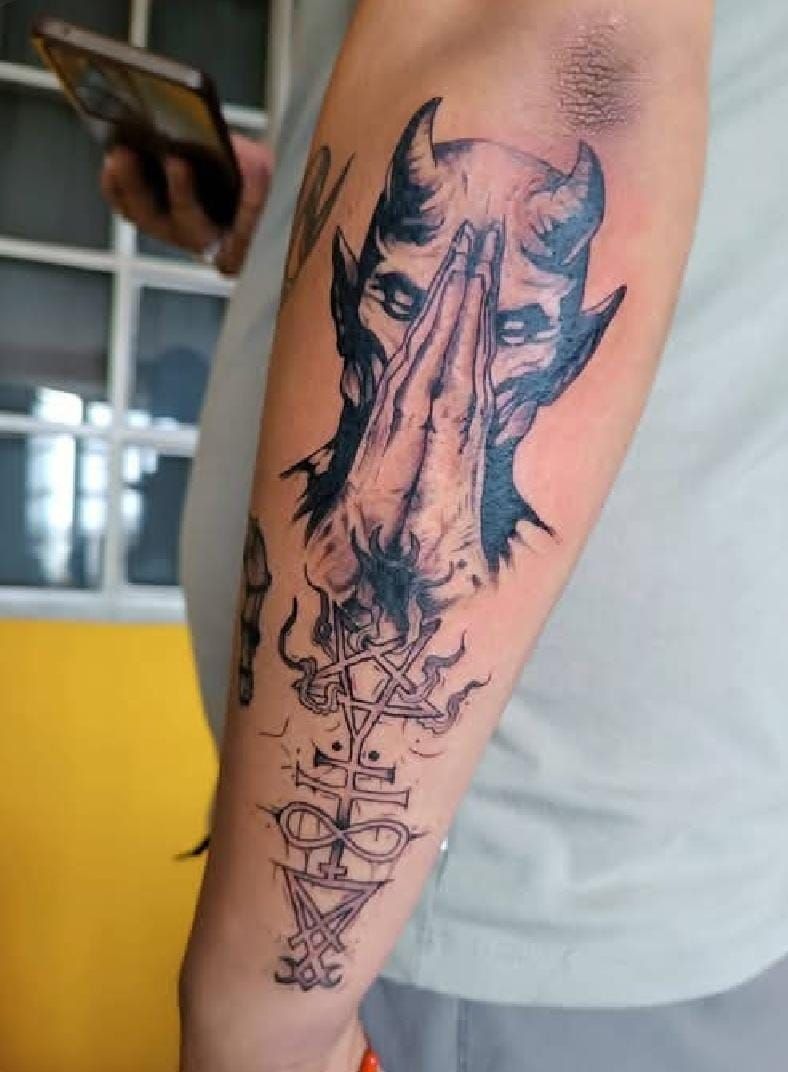 Praying Horned Devil Tattoo Design