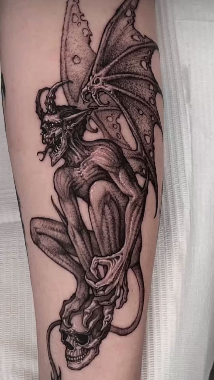 Skeletal Winged Creature Tattoo Design