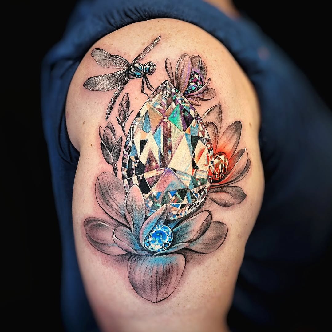 Elegant diamond tattoo surrounded by floral elements Tattoo Design