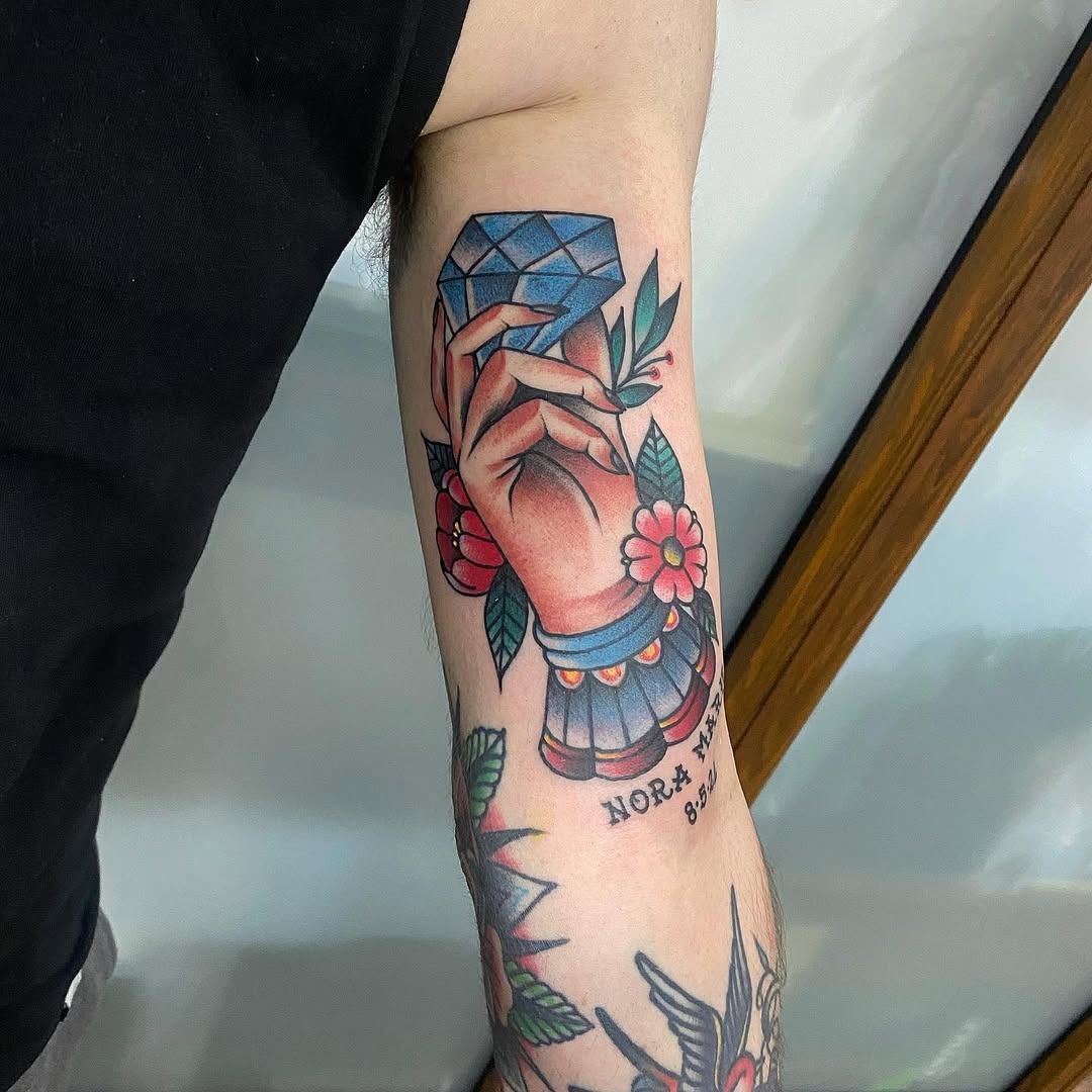 Elegant diamond tattoo with floral elements Tattoo Design