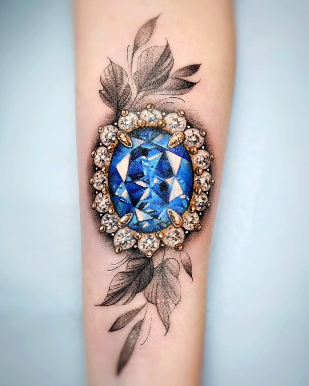 Glamorous blue diamond tattoo design with leaves Tattoo Design