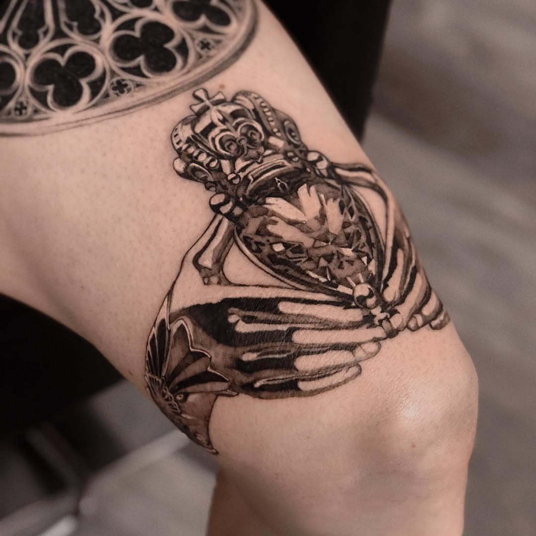 Intricate skeleton hand with diamond crown tattoo Tattoo Design
