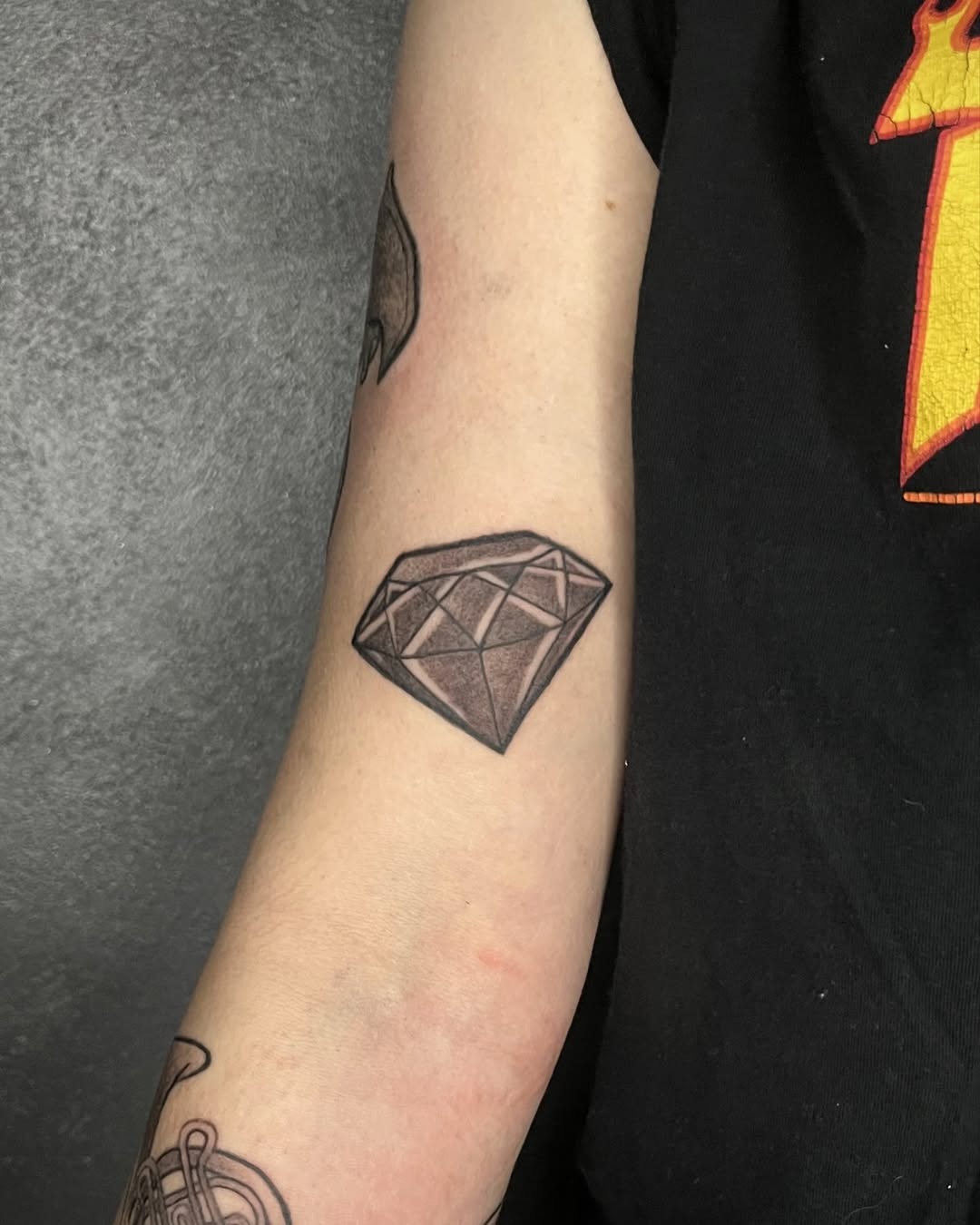 Minimalist diamond tattoo on the arm Tattoo Design