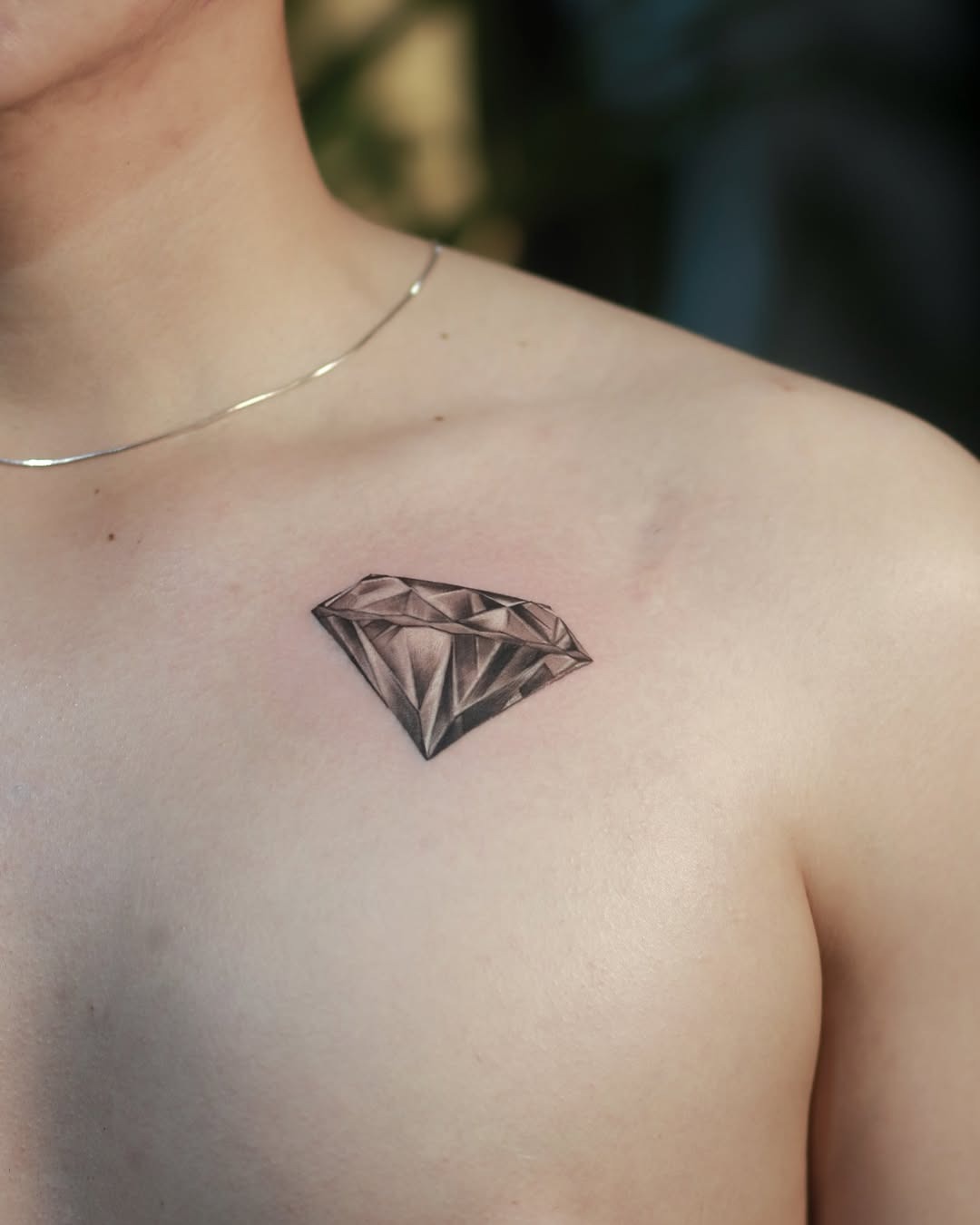 Realistic diamond tattoo on the chest Tattoo Design