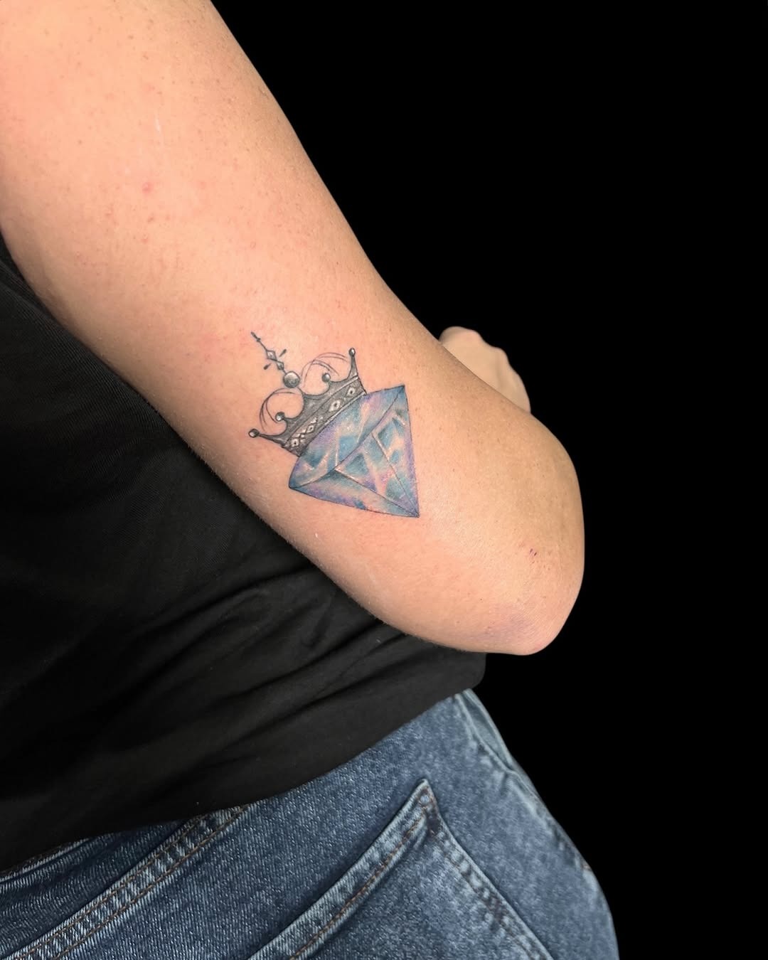 Stunning crown-adorned diamond tattoo on arm Tattoo Design