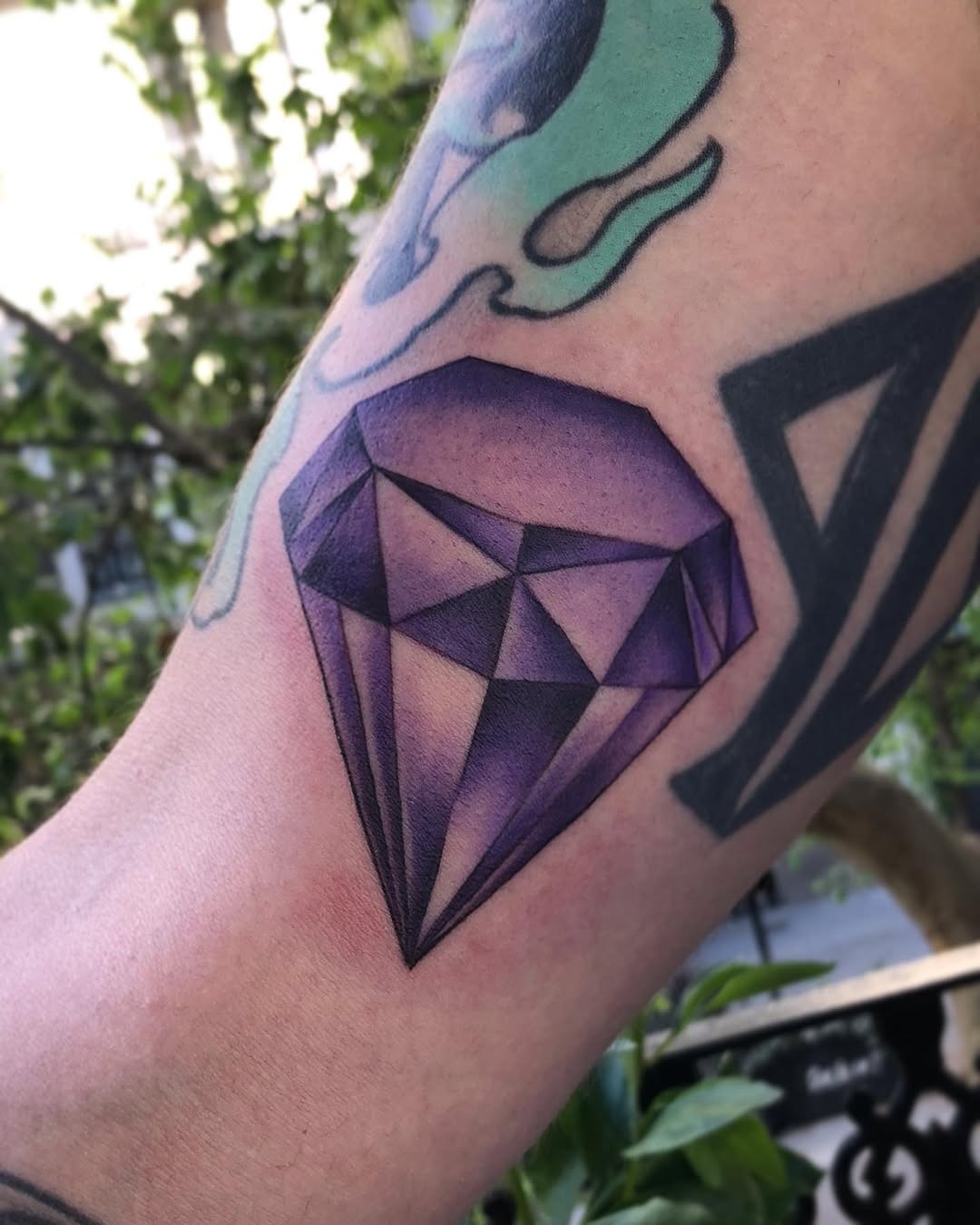 Stunning purple diamond tattoo on the arm Tattoo Design